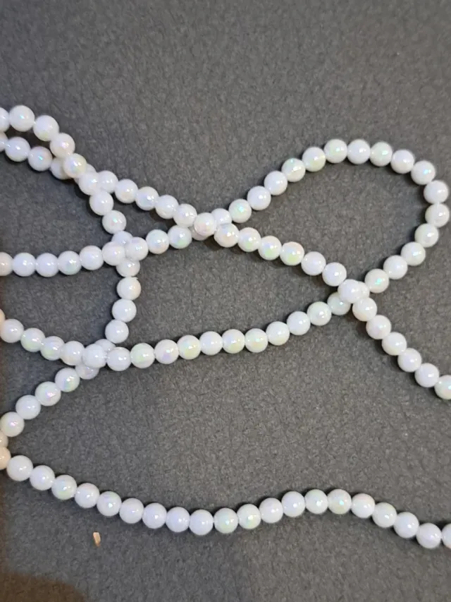 Bolsa de bolitas blancas para manualidades