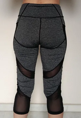 Mallas grises M-L con transparencias negras