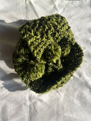 Sciarpa a maglia con  pon pon