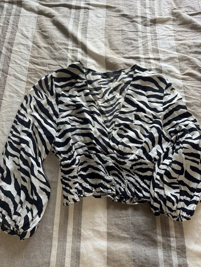 Blusa cebra escote