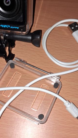 Cámara estilo GoPro marca NK funda Coca Cola