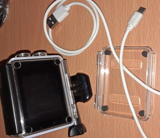 Cámara estilo GoPro marca NK funda Coca Cola