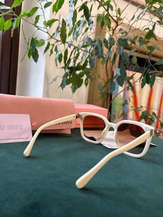 Occhiali da sole Miu Miu beige e marroni