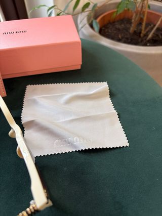 Occhiali da sole Miu Miu beige e marroni