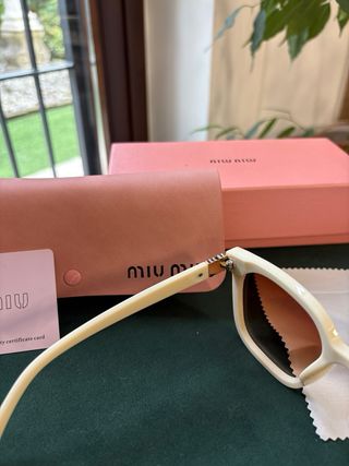 Occhiali da sole Miu Miu beige e marroni
