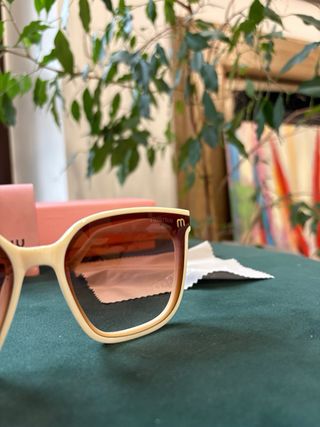 Occhiali da sole Miu Miu beige e marroni