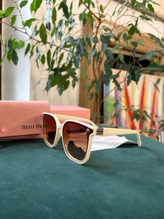 Occhiali da sole Miu Miu beige e marroni