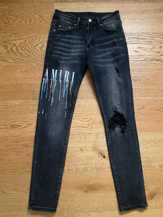 Jeans Amiri neri con stampa multicolor