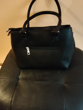 Bolso negro de piel sintética mochila de tela