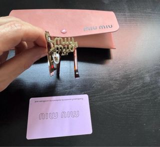 Gafas de sol Miu Miu doradas y rosas