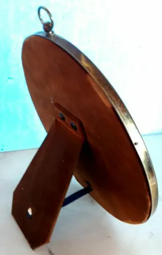 Cornice ovale classica in metallo dorato