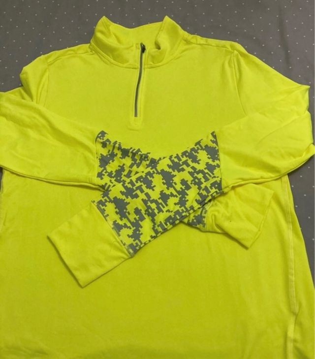 Camiseta deportiva cuello alto cremallera