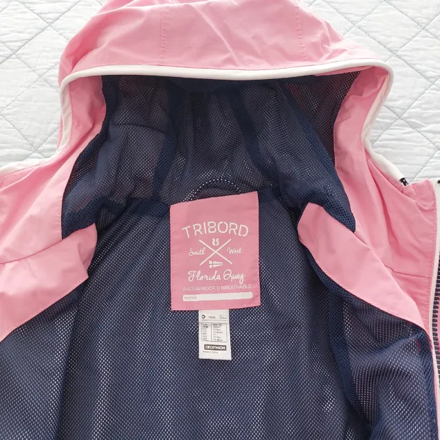 Chaqueta impermeable rosa cortavientos