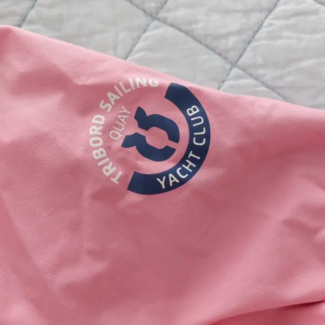 Chaqueta impermeable rosa cortavientos