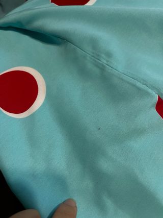 Traje de flamenca azul con lunares rojos