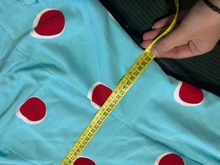 Traje de flamenca azul con lunares rojos