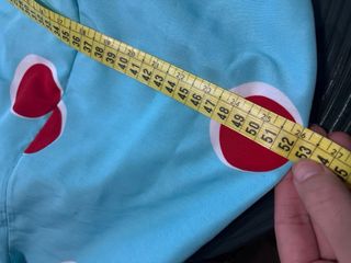 Traje de flamenca azul con lunares rojos