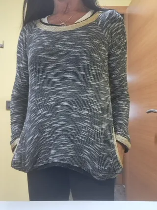 Jersey negro y dorado talla única