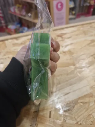 Vela em formato de crucifixo