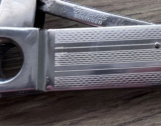 Cortapuros Domatus plateado