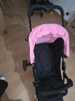 Silla de paseo rosa y negra
