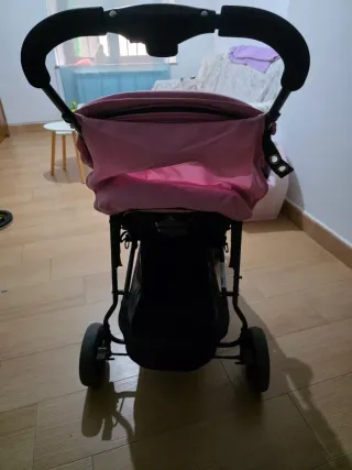 Silla de paseo rosa y negra