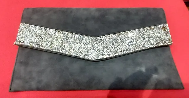 Bolso de mano elegante con cadena