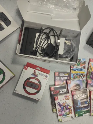 Nintendo Switch + Giochi e Accessori