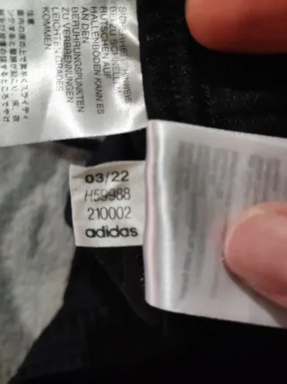 Pantalones deportivos Adidas negros y blancos