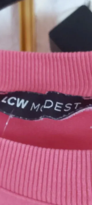 Sudadera larga rosa con mensaje