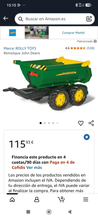 Tractor de pedales verde con pala y remolque