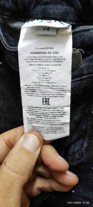 Jeans skinny neri con dettagli a pois