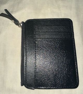 Tarjetero negro con cremallera