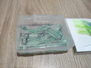 Lote de señuelos pesca y plumas.