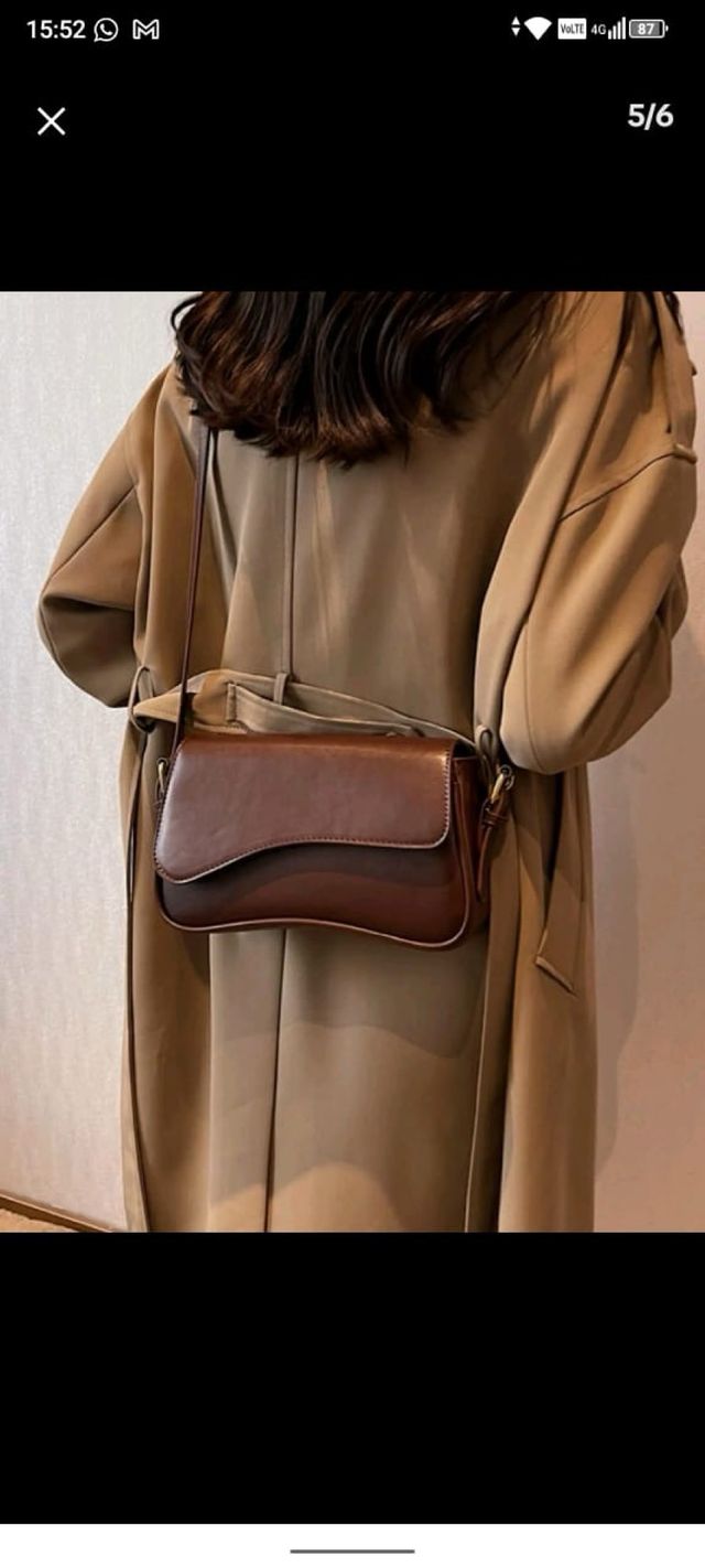 Cárdigan marrón de rayas con botones