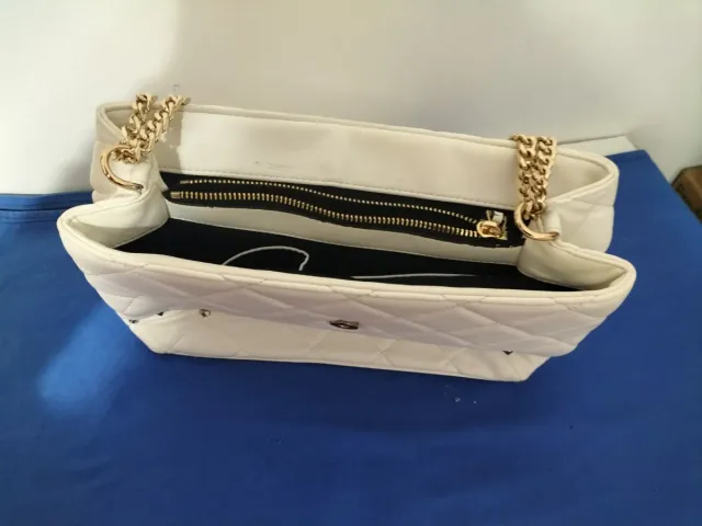 Borsa Le Carrie bianca trapuntata con borchie