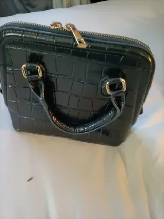Bolso de mano Zara negro y dorado
