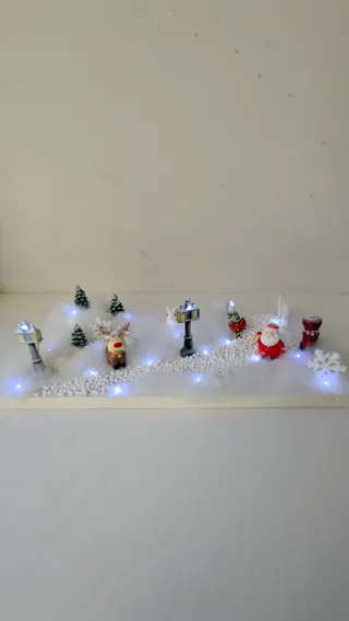 Villaggio di Natale artigianale con luci