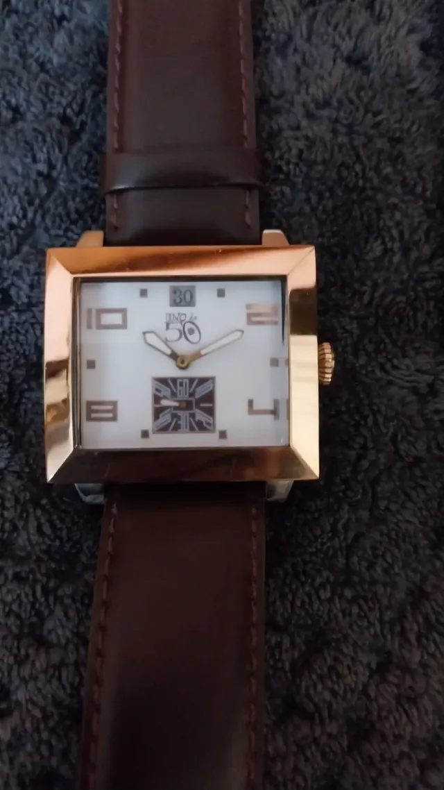 2 Relojes uno de Cincuenta