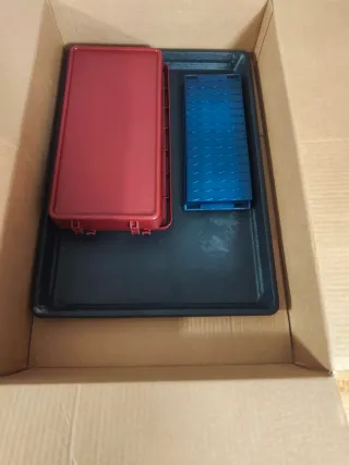 Jaula para hurón negra y rosa