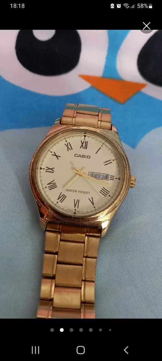 Reloj Casio Dorado y Blanco