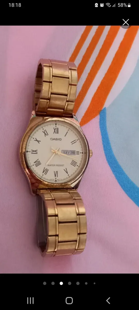 Reloj Casio Dorado y Blanco