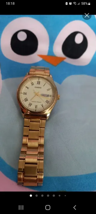 Reloj Casio Dorado y Blanco