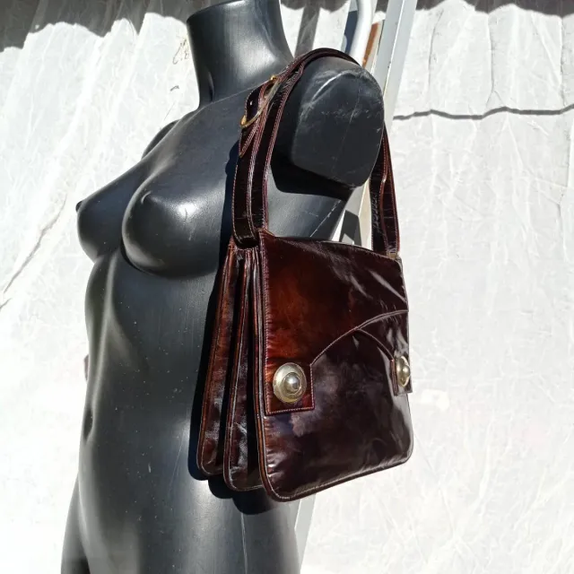 Borsa antica in pelle verniciata color ruggine
