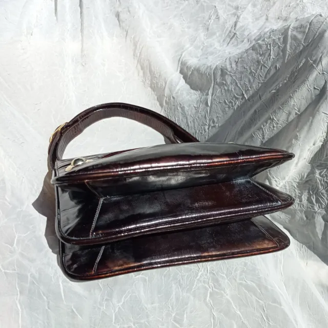 Borsa antica in pelle verniciata color ruggine