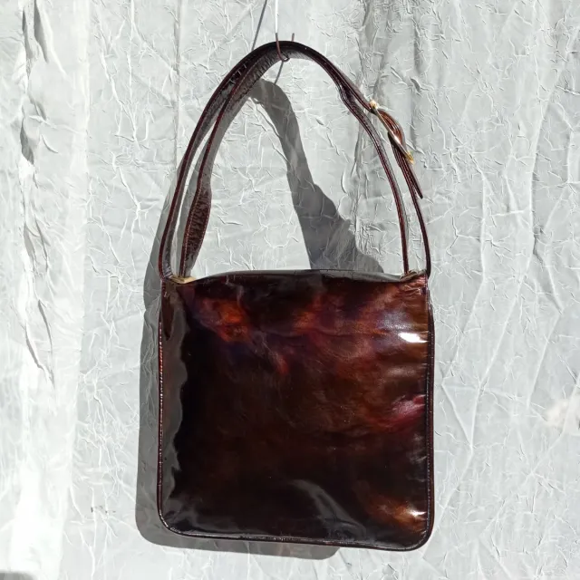 Borsa antica in pelle verniciata color ruggine