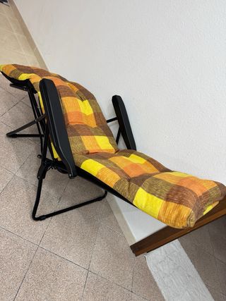 Poltrona reclinabile con cuscino a quadri