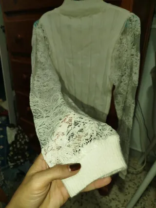 Jersey cuello alto lana y encaje
