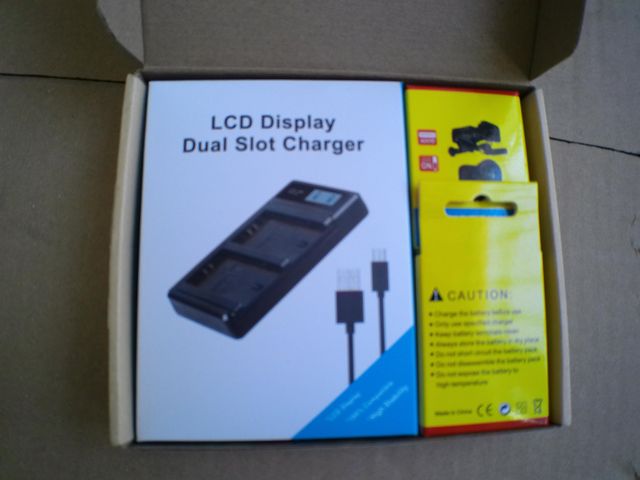 Caricabatterie doppio NP-FW50 + 2 batterie