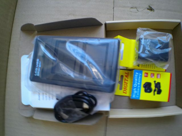 Caricabatterie doppio NP-FW50 + 2 batterie